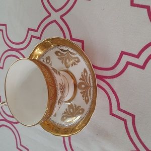 Stunning white and gold cup and saucer